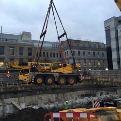 lifting one of our Terex Demag ac80-2 into a basemant Dublin 